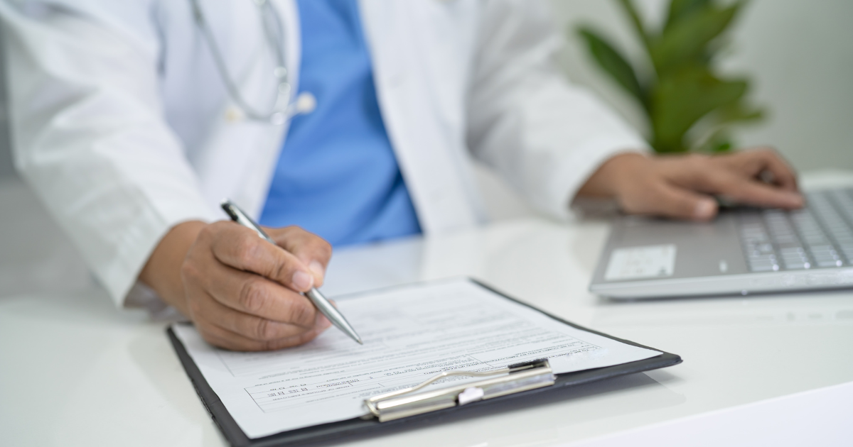 CCC physician reviewing hormone health and the possibility of hormone therapy intake form for evidence-based HRT in Las Vegas